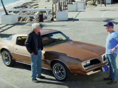 Jay Leno with gold Firebird